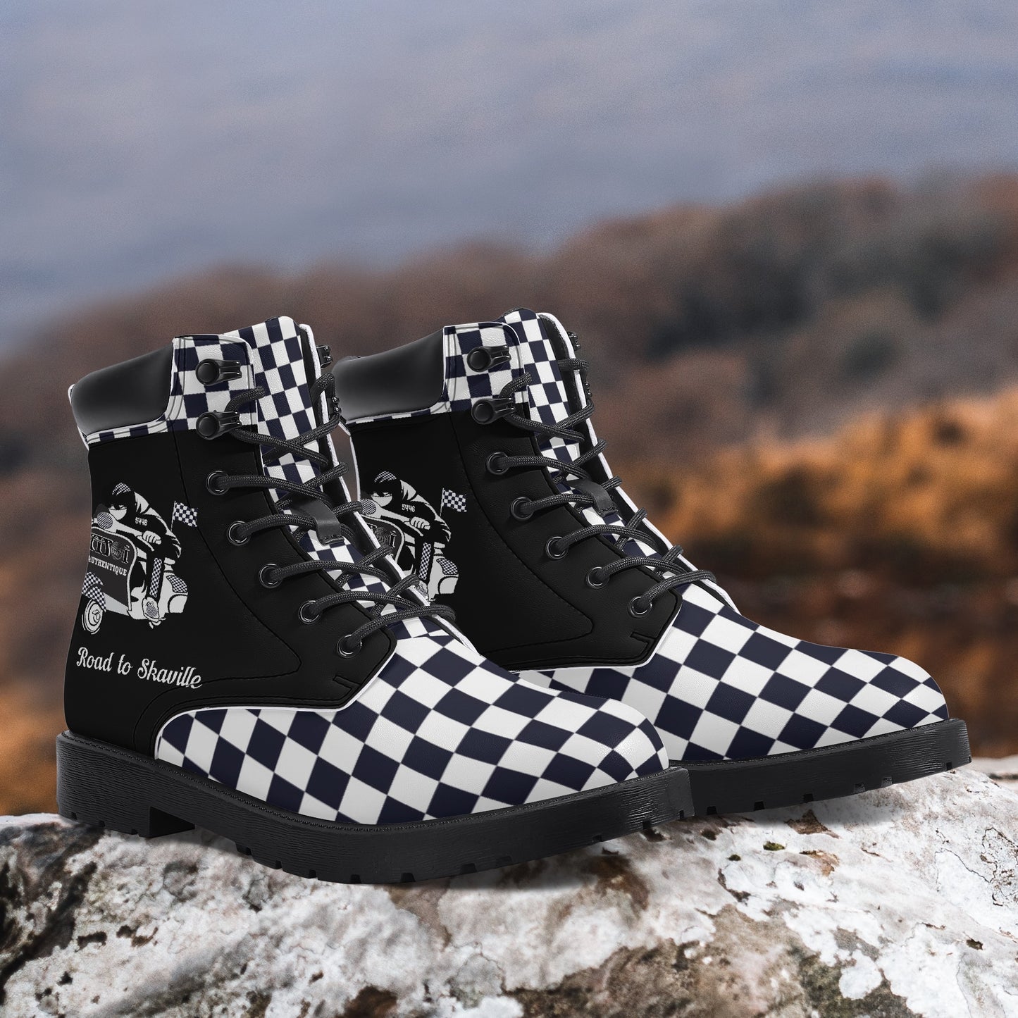 Black and white checkered boots with mountainous background