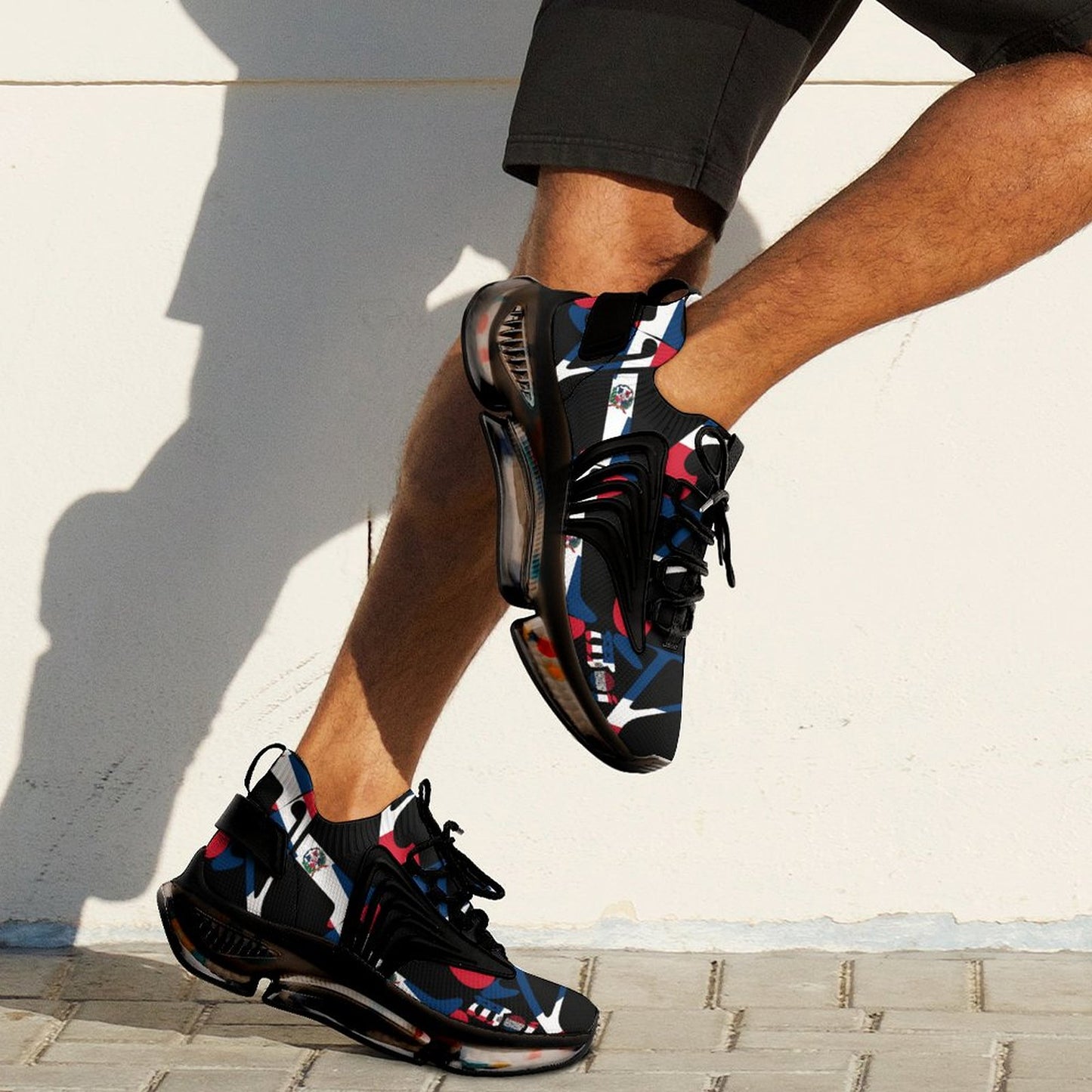 Person wearing colourful athletic shoes with a neutral background