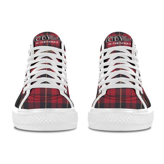 Red and black plaid sneakers with white laces on a white background