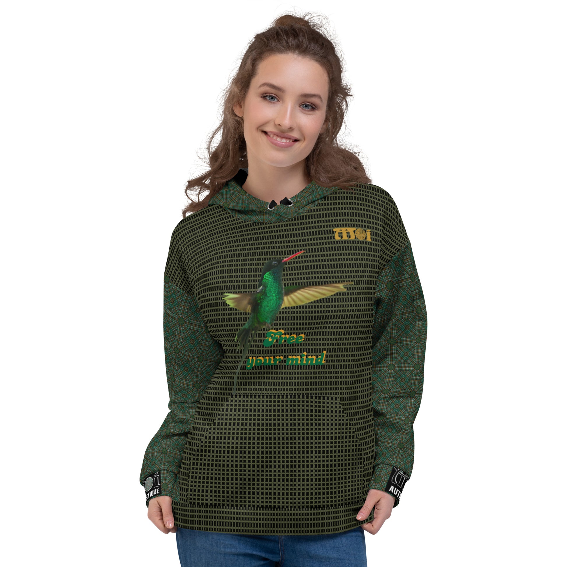 Woman wearing a green hoodie with a hummingbird design and text on a white background