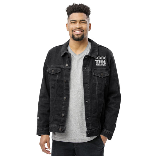 Man wearing a black denim jacket with a brand logo on a white background