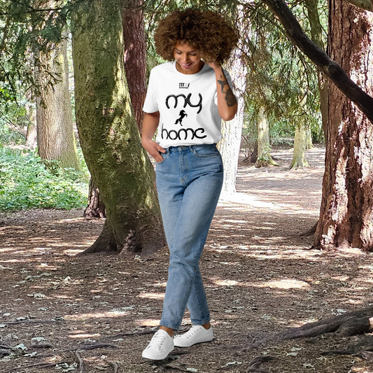 Girl in the woods wearing a white t-shirt and jeans with a small image of a horse with the wording my home.
